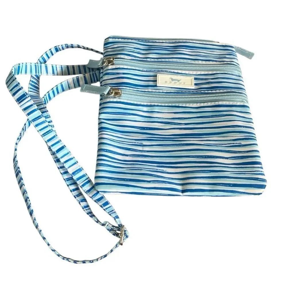 Scout coastal Crossbody bag. Small pin marks as depicted in pictures.